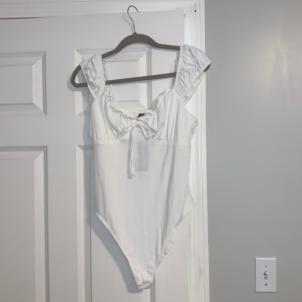 White body suit, size L